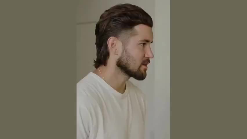 Slicked-Back Mullet Fade: Polished and Edgy